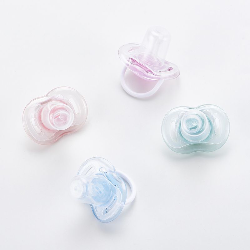 Flat silicone nipple baby teether and food feeder, made from food-grade material for safe chewing and feeding.