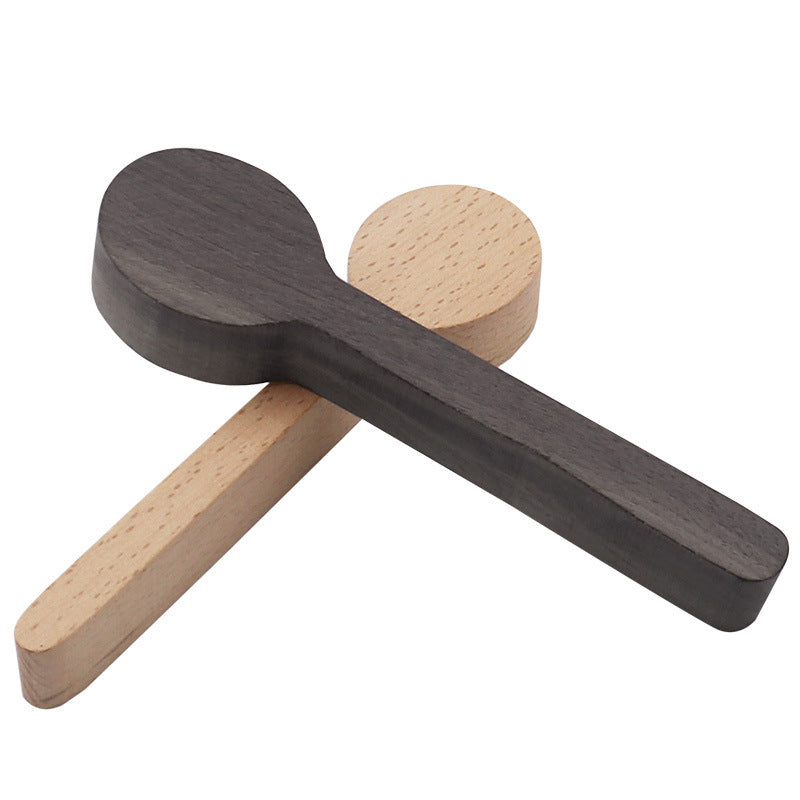 Hand-carved handmade wooden spoons for kitchen use, perfect for cooking, serving, and gifting.
