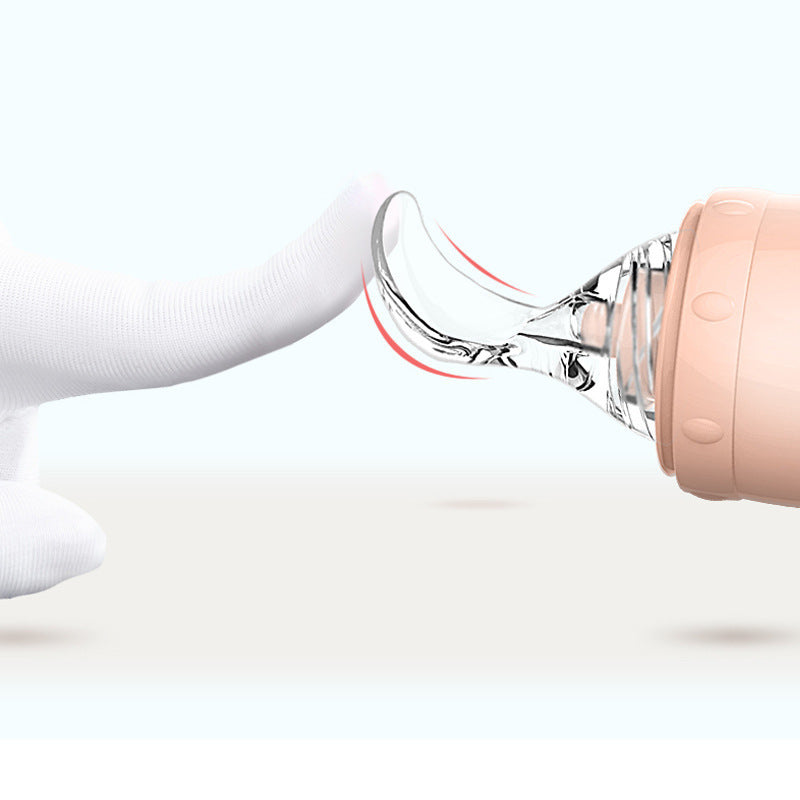 Silicone baby food spoon for rice cereal and puree; soft BPA-free spoon for safe infant feeding and gum protection.