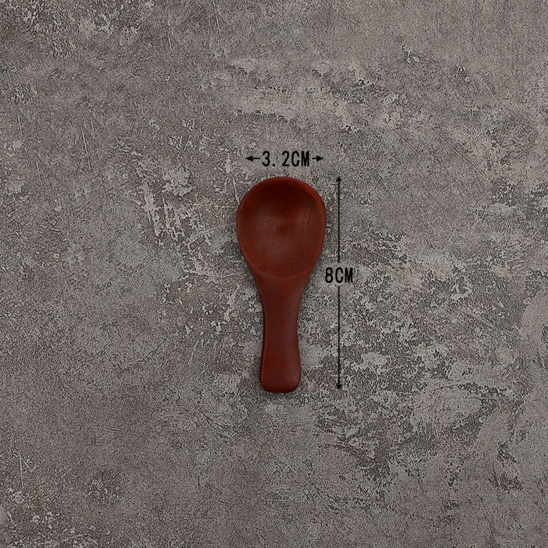 Set of solid wooden kitchen spoons for household cooking and serving – eco-friendly and durable utensils.