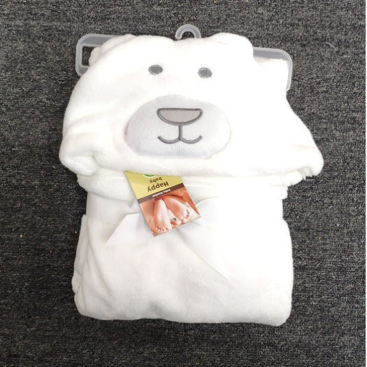 Soft baby bath towel folded next to bath essentials