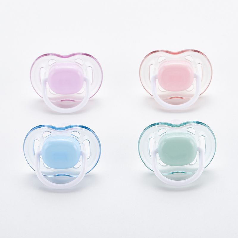 Flat silicone nipple baby teether and food feeder, made from food-grade material for safe chewing and feeding.