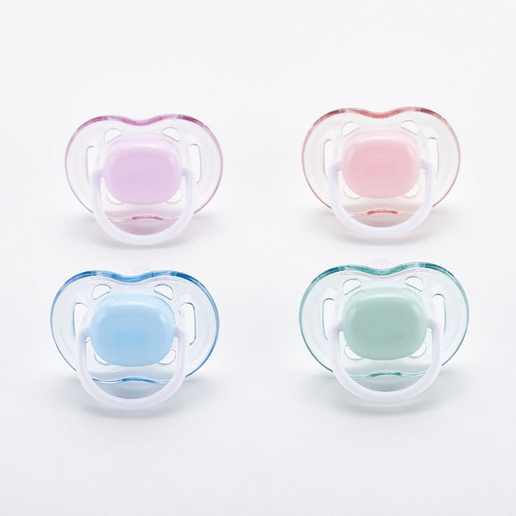 Flat silicone nipple baby teether and food feeder, made from food-grade material for safe chewing and feeding.