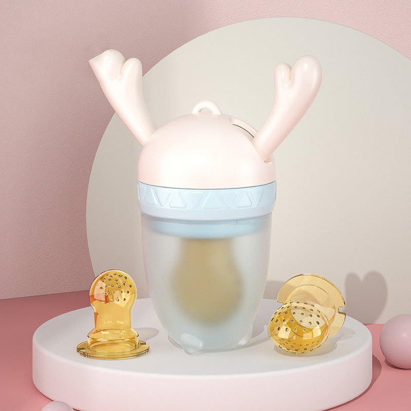 Soft silicone baby teether nipple with molar stick design and food feeder for safe teething and feeding.
