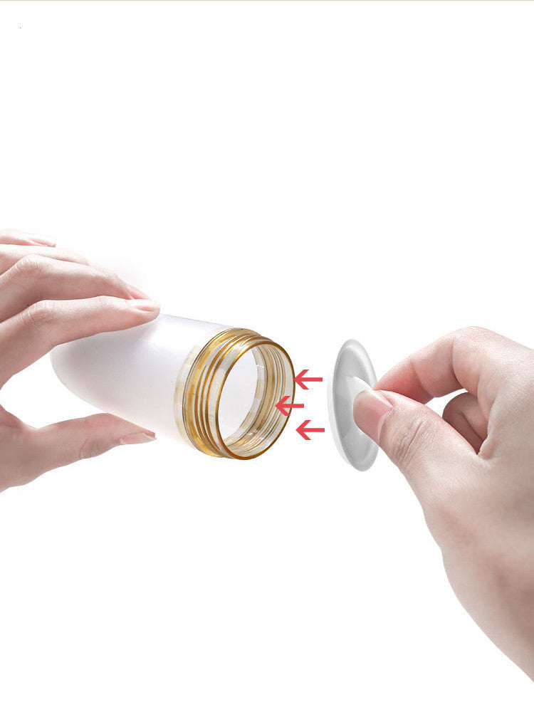 Soft silicone baby rice cereal spoon feeder with squeeze function for mess-free feeding.
