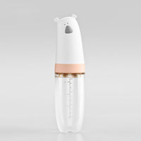 Soft silicone baby rice cereal spoon feeder with squeeze function for mess-free feeding.
