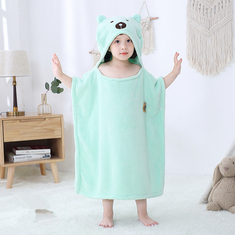 Baby in mint green hooded towel with smiling bear design. Soft polyester bathrobe for infants, antibacterial and cozy.