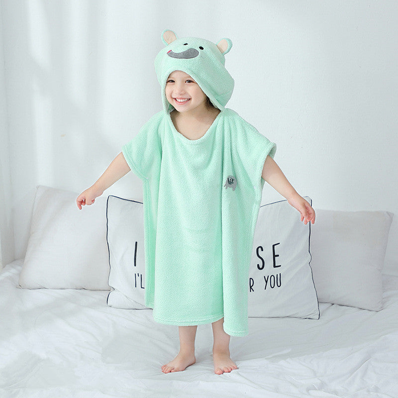 Child in beige hooded towel with bear ears. Infant bathrobe made of coral fleece, antibacterial and gentle on baby skin.