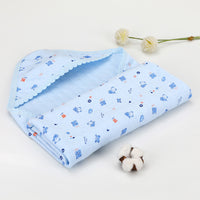 Light blue cotton hooded baby blanket with cartoon bear design. Breathable and soft quilt for summer and spring use.