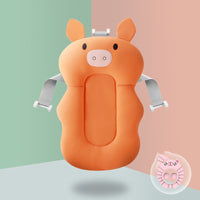 Orange pig Non-slip Sponge Baby Bath with blue rinse cup, designed for safe and spine-supportive baby bathing.