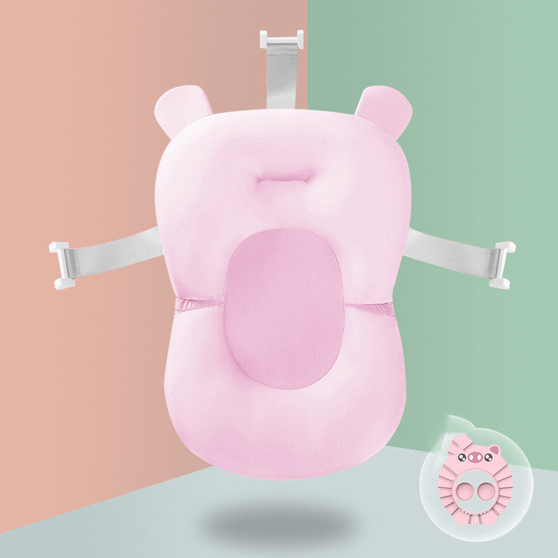 Pink Non-slip Sponge Baby Bath with blue rinse cup, ensuring safe and spine-supportive bath time for babies.