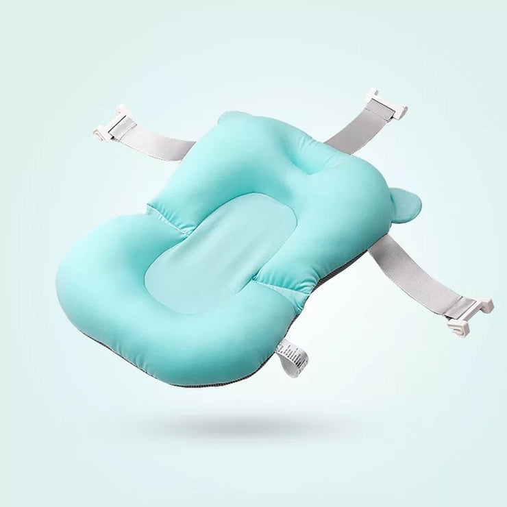 Soft adjustable baby bath net for newborns – suspended design for safety and comfort during bath time.

