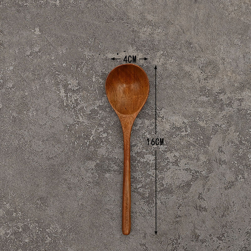 Set of solid wooden kitchen spoons for household cooking and serving – eco-friendly and durable utensils.
