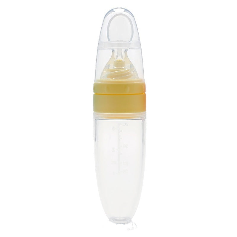 Silicone baby food spoon for rice cereal and puree; soft BPA-free spoon for safe infant feeding and gum protection.
