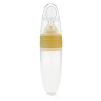 Silicone baby food spoon for rice cereal and puree; soft BPA-free spoon for safe infant feeding and gum protection.

