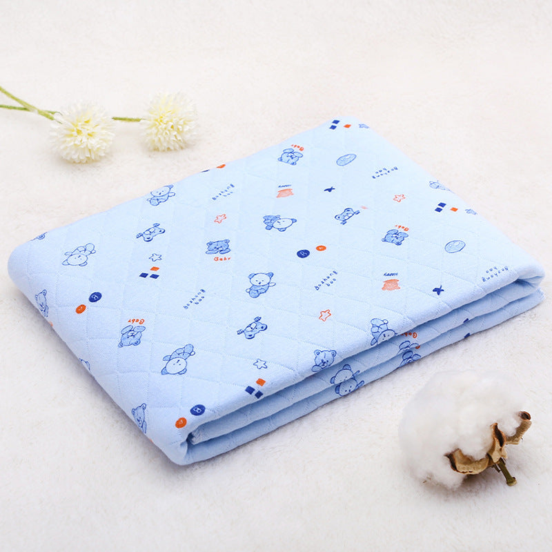 Folded light blue cotton baby blanket with cartoon bear pattern. Soft and thin quilt perfect for spring and summer.
