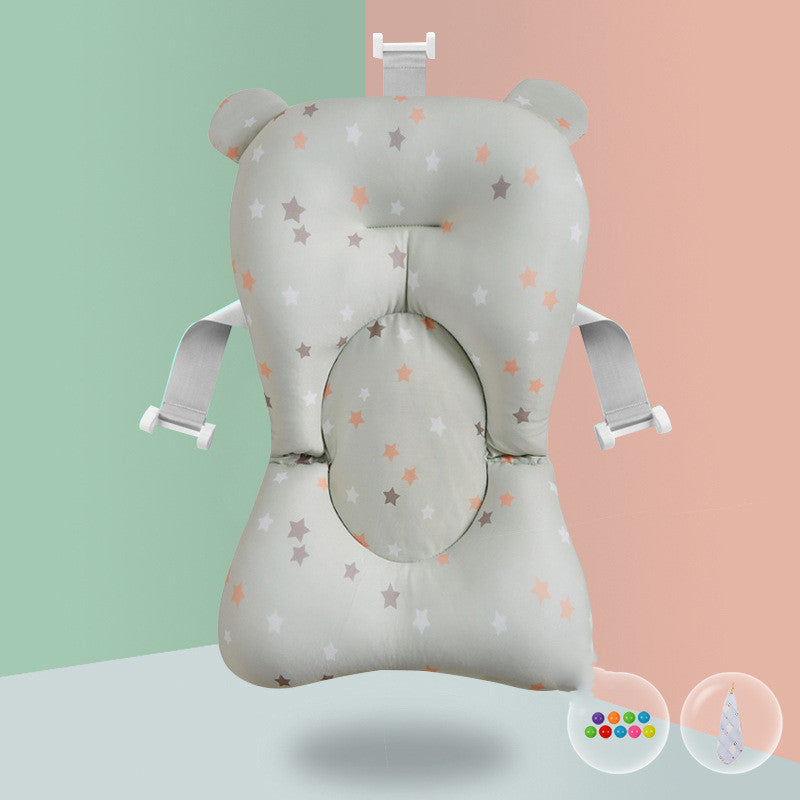 Star-patterned baby bath sponge with pink lion teether, designed for spine protection and playful infant bathing.