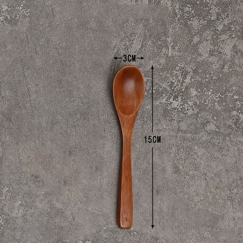 Set of solid wooden kitchen spoons for household cooking and serving – eco-friendly and durable utensils.
