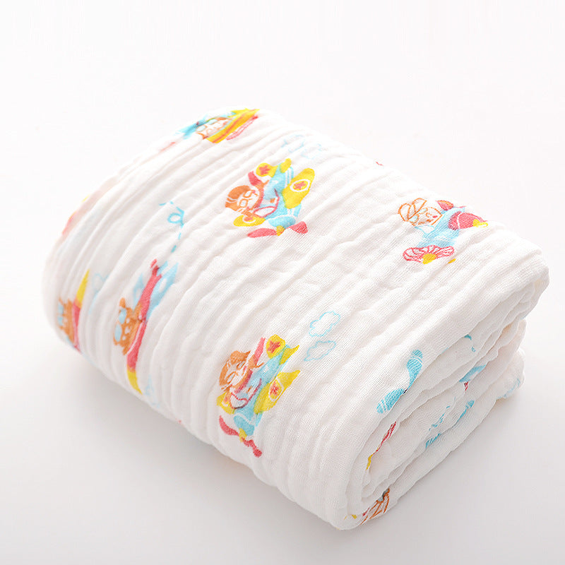 Blue and green whale print cotton baby bath towel with six-layer seersucker quilt, soft and absorbent for infants.