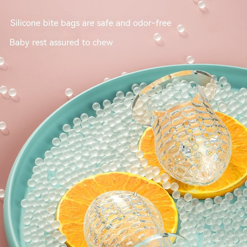 Happy Bite baby fruit feeder teether with soft silicone for introducing non-staple food and soothing teething discomfort.
