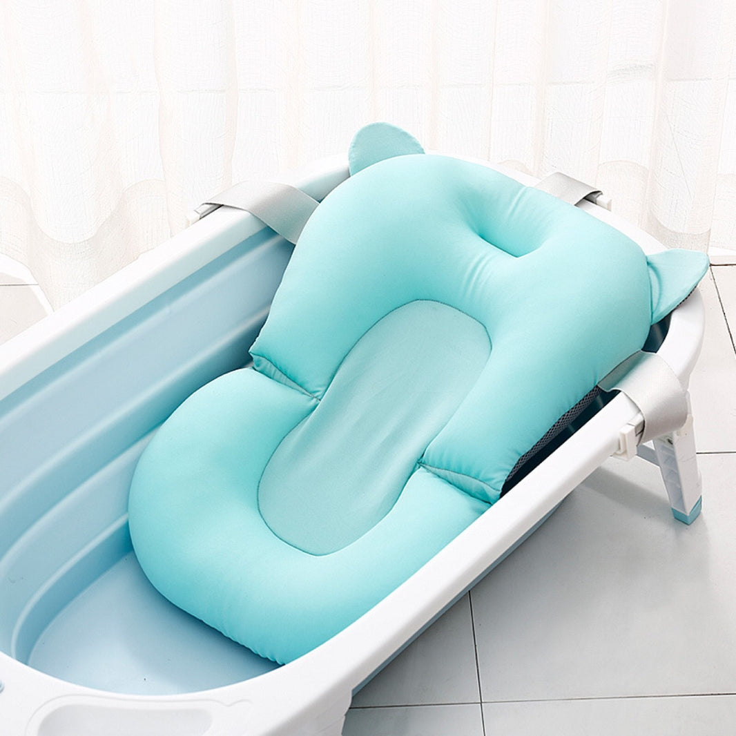 Soft adjustable baby bath net for newborns – suspended design for safety and comfort during bath time.
