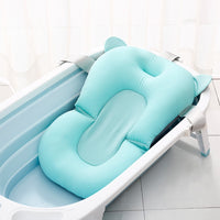 Soft adjustable baby bath net for newborns – suspended design for safety and comfort during bath time.
