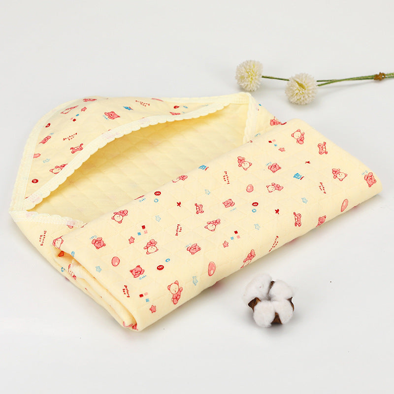 Yellow cotton hooded baby blanket with cartoon print and soft quilted texture. Ideal for spring and summer comfort.