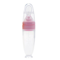 Silicone baby food spoon for rice cereal and puree; soft BPA-free spoon for safe infant feeding and gum protection.
