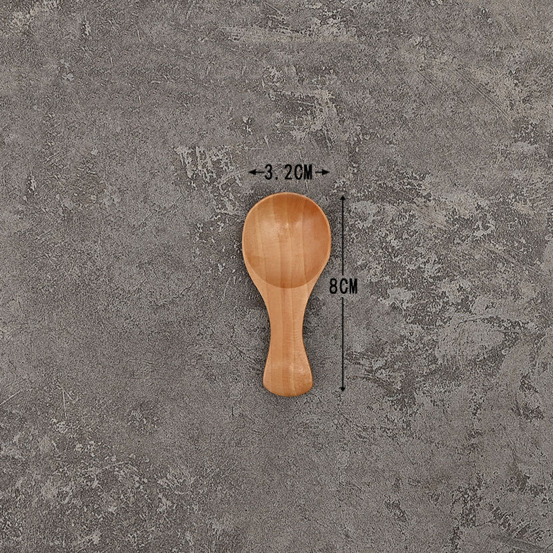 Set of solid wooden kitchen spoons for household cooking and serving – eco-friendly and durable utensils.
