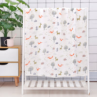 Pink baby essentials print cotton bath towel with soft seersucker quilt, perfect for newborns and infants.