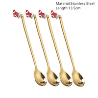 Festive Merry Christmas party spoons for holiday dinners and table decorations – red and green Xmas-themed cutlery.
