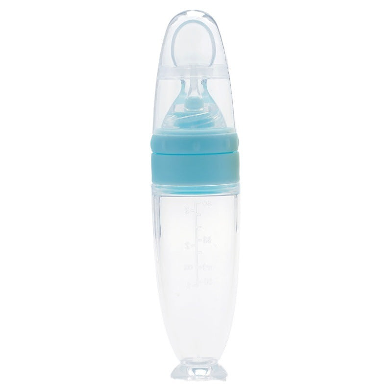Silicone baby food spoon for rice cereal and puree; soft BPA-free spoon for safe infant feeding and gum protection.
