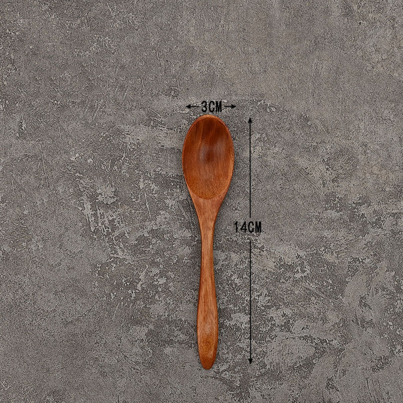 Set of solid wooden kitchen spoons for household cooking and serving – eco-friendly and durable utensils.

