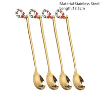 Festive Merry Christmas party spoons for holiday dinners and table decorations – red and green Xmas-themed cutlery.
