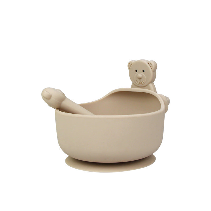 Silicone baby bowl and spoon set – food-grade, BPA-free suction bowl with soft-tip spoon for safe toddler feeding.
