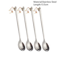 Festive Merry Christmas party spoons for holiday dinners and table decorations – red and green Xmas-themed cutlery.

