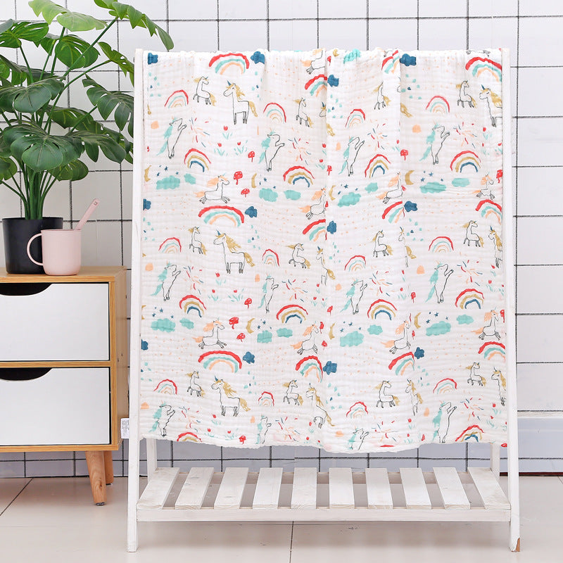 Colorful vehicle print cotton baby bath towel with soft seersucker quilt layers, perfect for toddlers and quick moisture absorption.