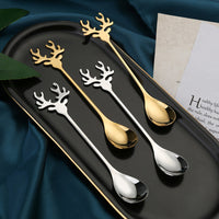 Festive Merry Christmas party spoons for holiday dinners and table decorations – red and green Xmas-themed cutlery.
