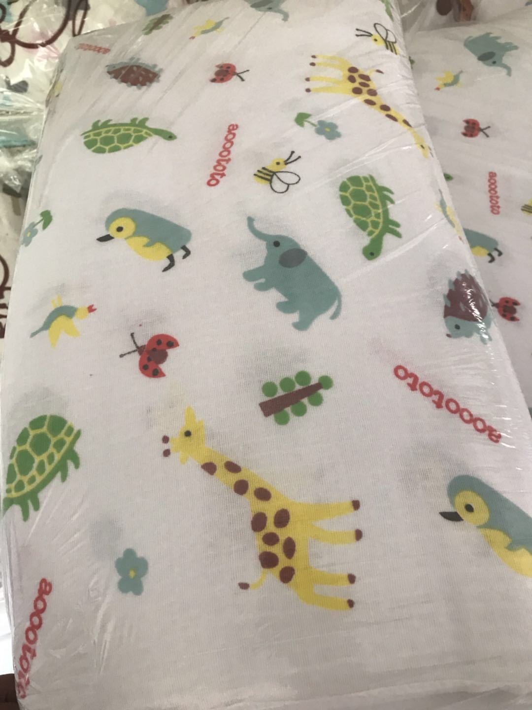 Cartoon Baby Bath Towel - Cotton Yarn | Lightweight, 60x120cm, printed with jungle animals like giraffes, turtles, and elephants on soft fabric.