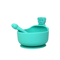 Silicone baby bowl and spoon set – food-grade, BPA-free suction bowl with soft-tip spoon for safe toddler feeding.
