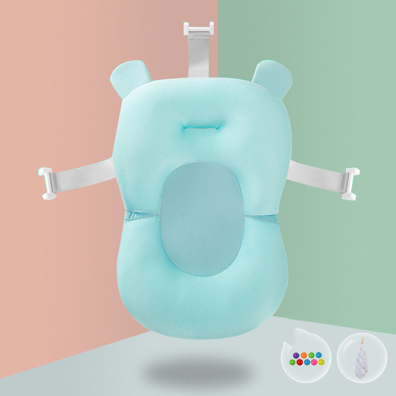 Aqua baby bath sponge with pink lion teether accessory, designed for safe and comfortable infant bathing.