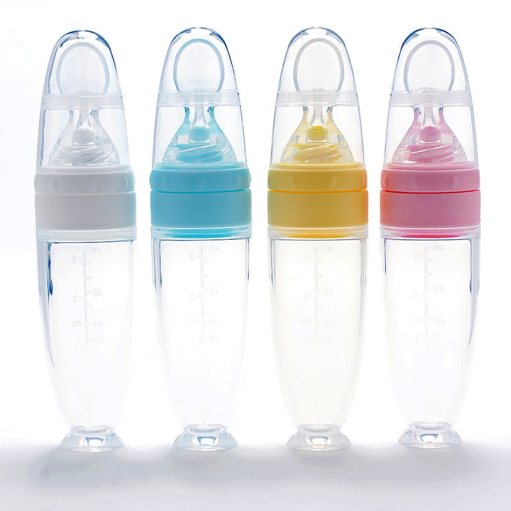 Silicone baby food spoon for rice cereal and puree; soft BPA-free spoon for safe infant feeding and gum protection.
