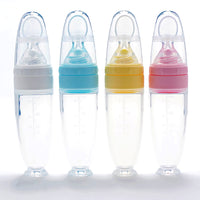 Silicone baby food spoon for rice cereal and puree; soft BPA-free spoon for safe infant feeding and gum protection.
