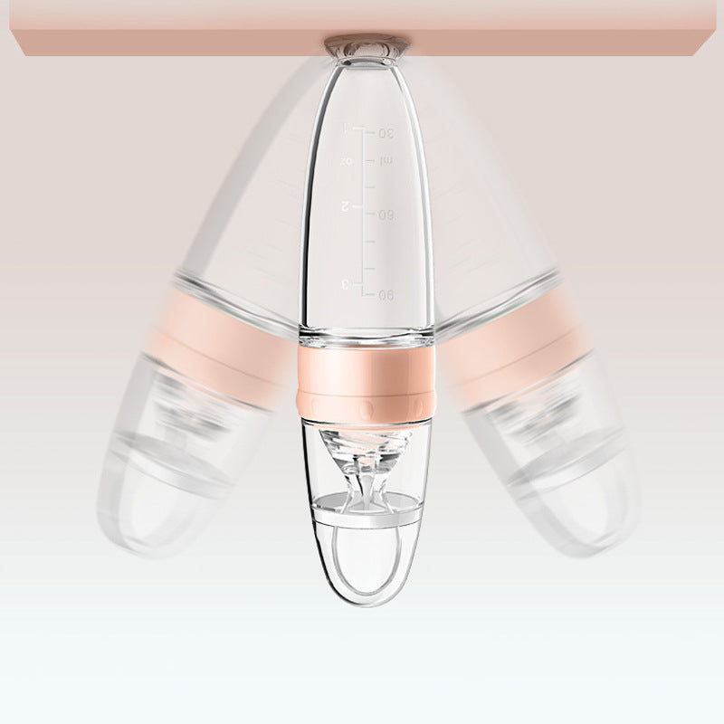 Silicone baby food spoon for rice cereal and puree; soft BPA-free spoon for safe infant feeding and gum protection.
